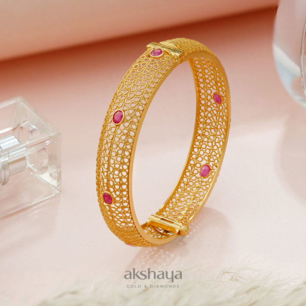 Gold Bangle with Precious Stone